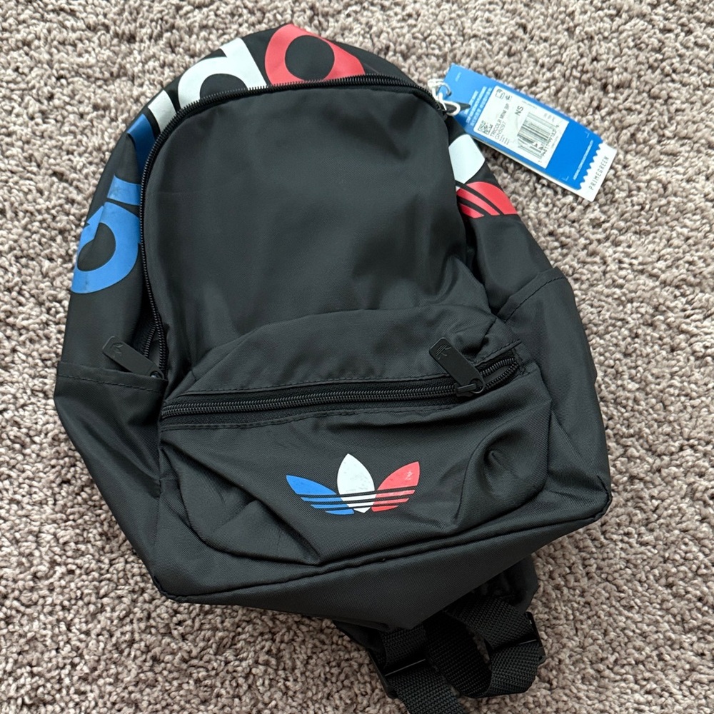 Adidas Black Backpack with Red and Blue Accents